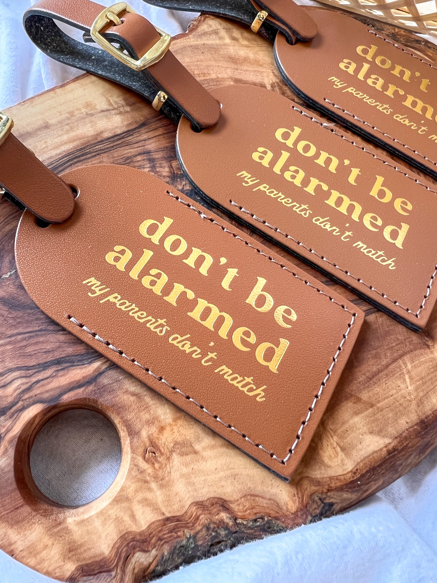 "Don't Be Alarmed" Leather Luggage Tag.
